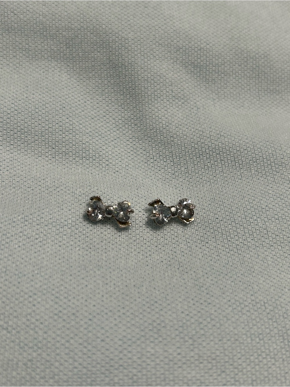 Delicate Crystal Bow Stud Earrings - Silver Tone